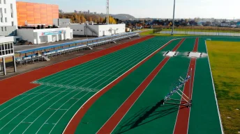 Thi công sân điền kinh trên nền nhựa với sơn Cao Su POLYURETHANE TOPSPORTS 7 lớp